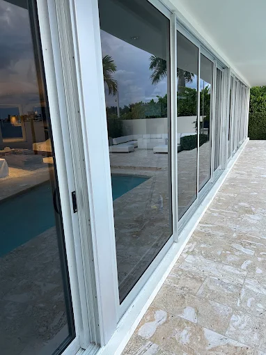 Large sliding glass doors in Orange Park pool patio