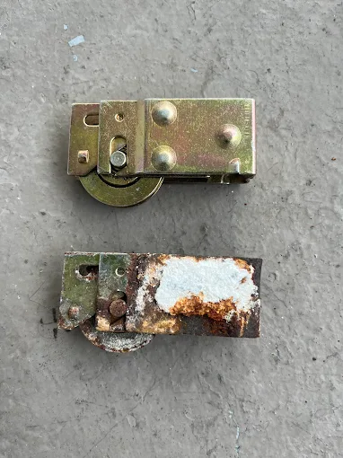 Sliding door roller before and after replacement